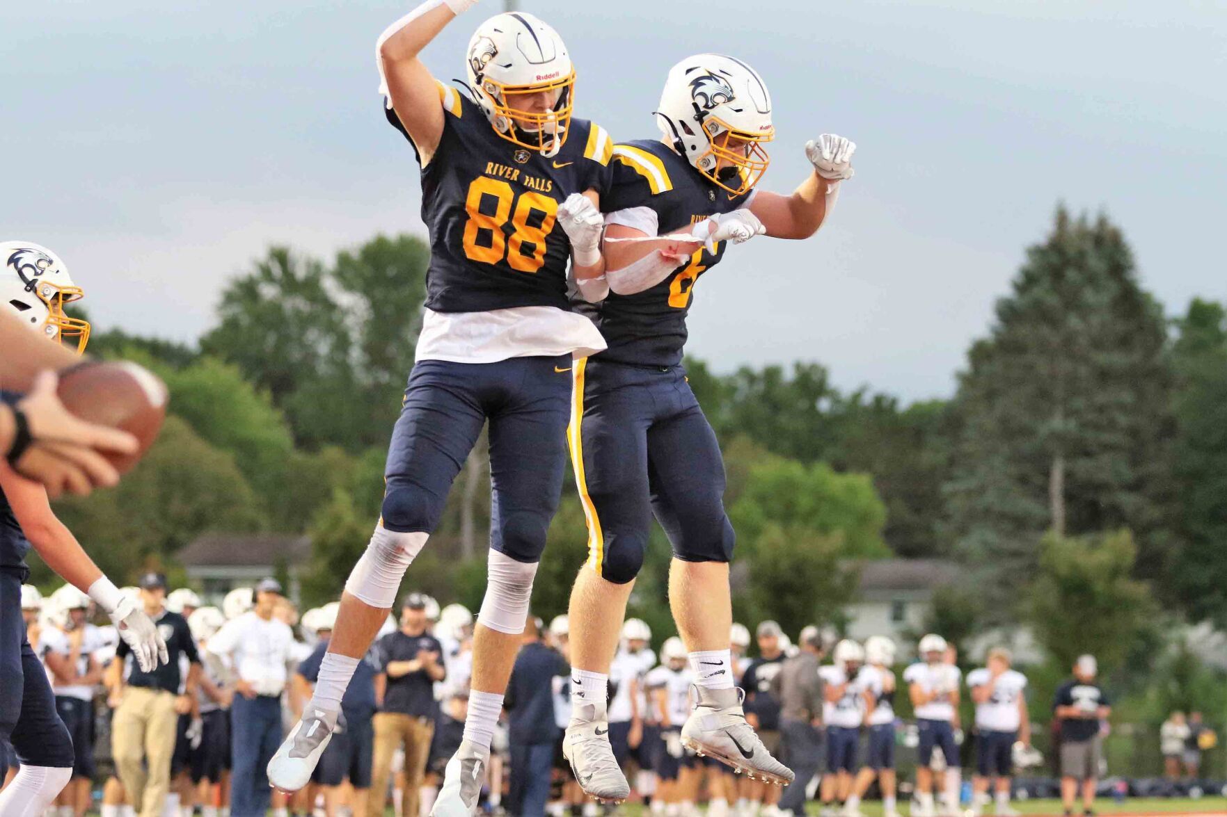 River Falls’ Ethan Campbell (88) and Cade Myszewski (6)